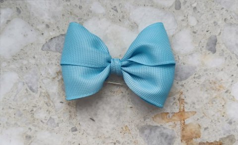 Niebieska kokardka do wózka na agrafce